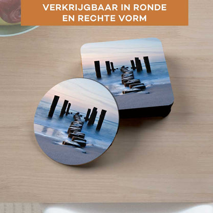 Onderzetter - Golfbreker op het strand